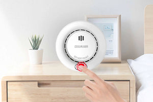 What triggers smoke alarm?