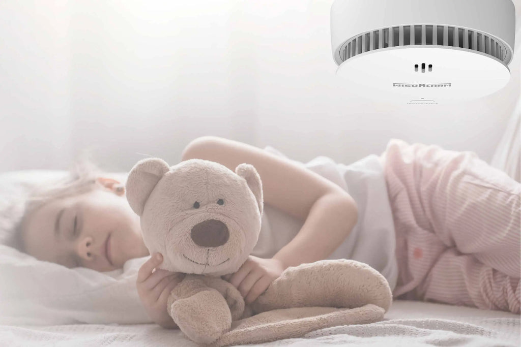 Why is my interlinked smoke alarm beeping at night?